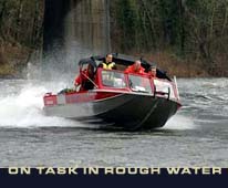 Photo of fire department rescue boat in high water.